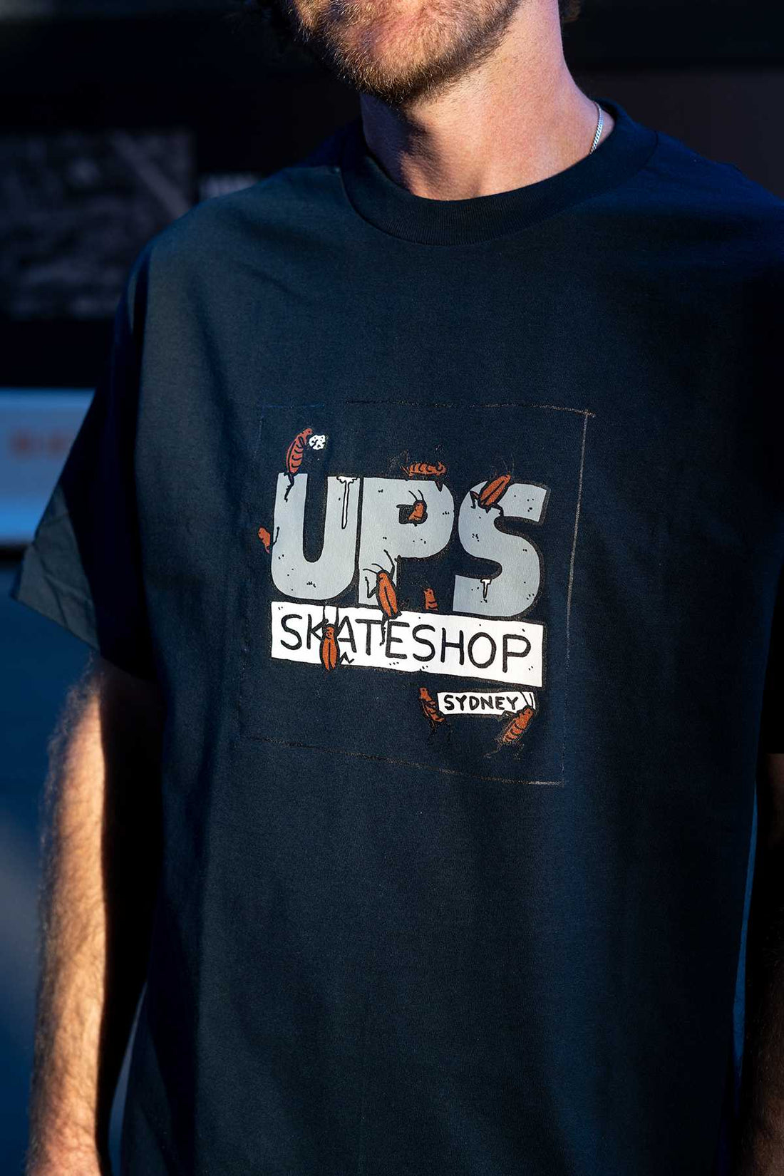 U.P.S. and todd francis cockroach tee
