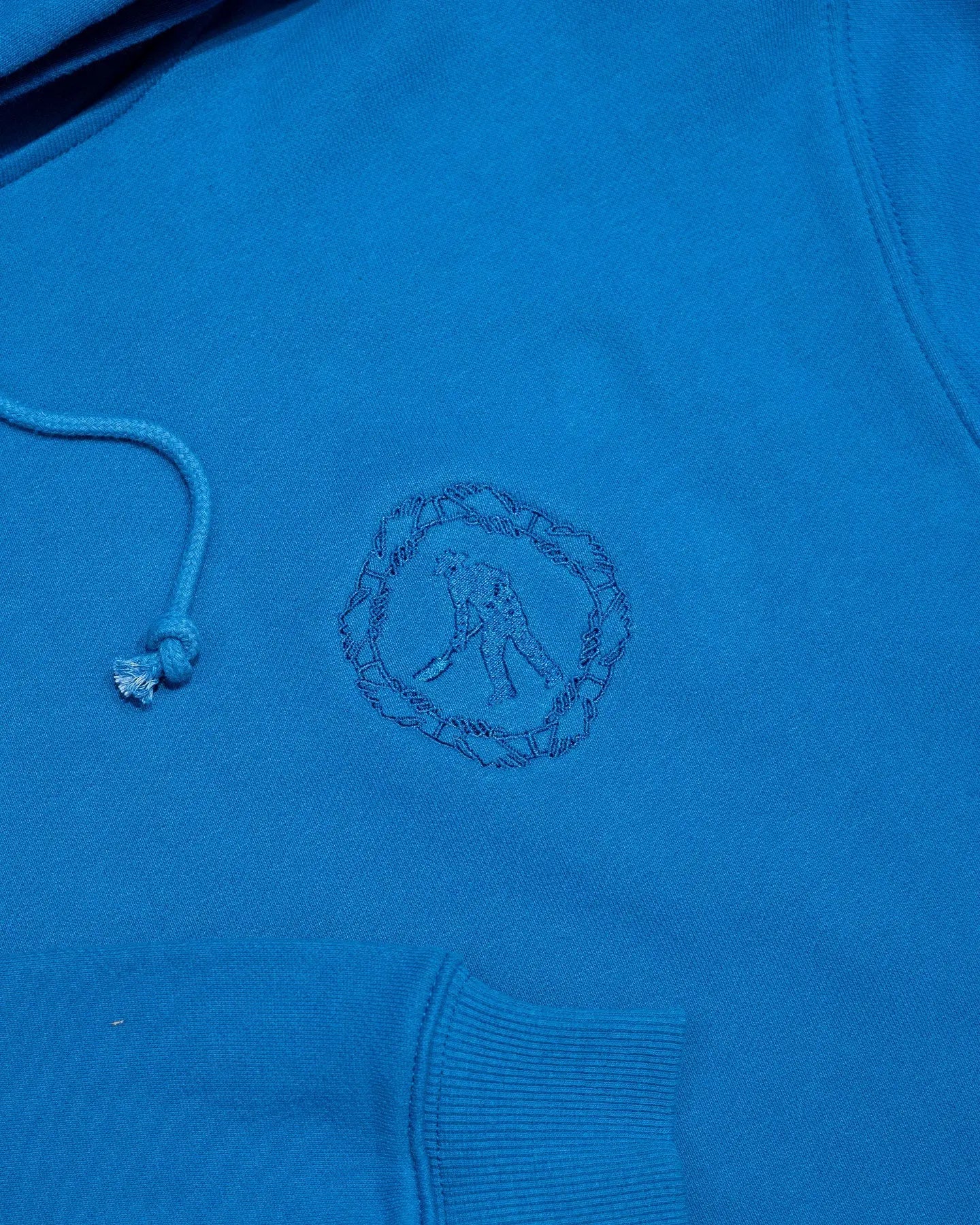 pass port organic embroidered hood royal blue