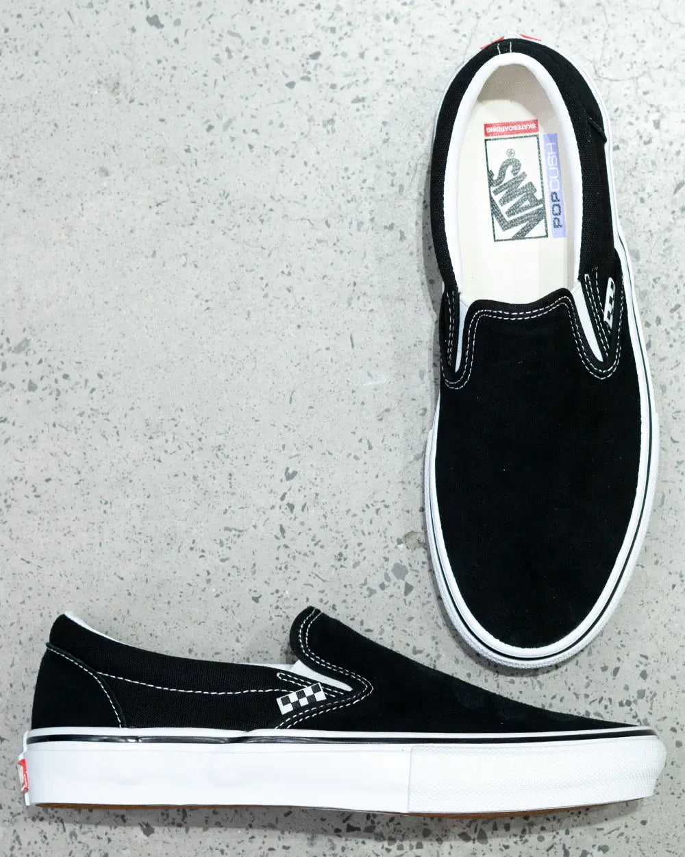 black white vans skate slip on